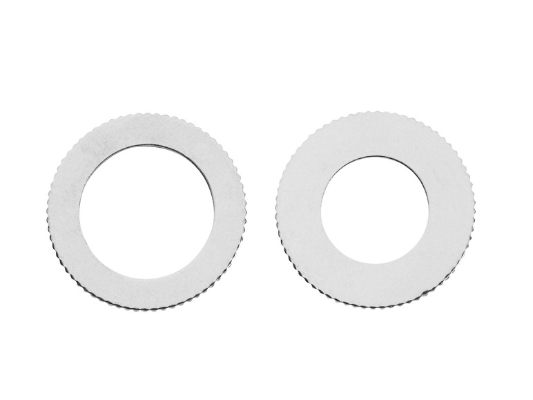 Twee metalen ringen met een gekartelde rand.