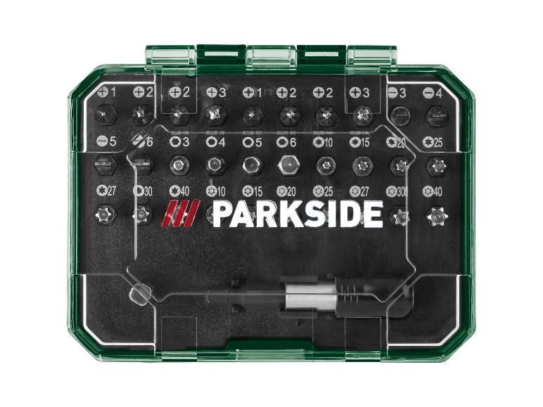 Schroevendraaierbitset met diverse Phillips-, platte, Torx- en inbusbits in een groene koffer.