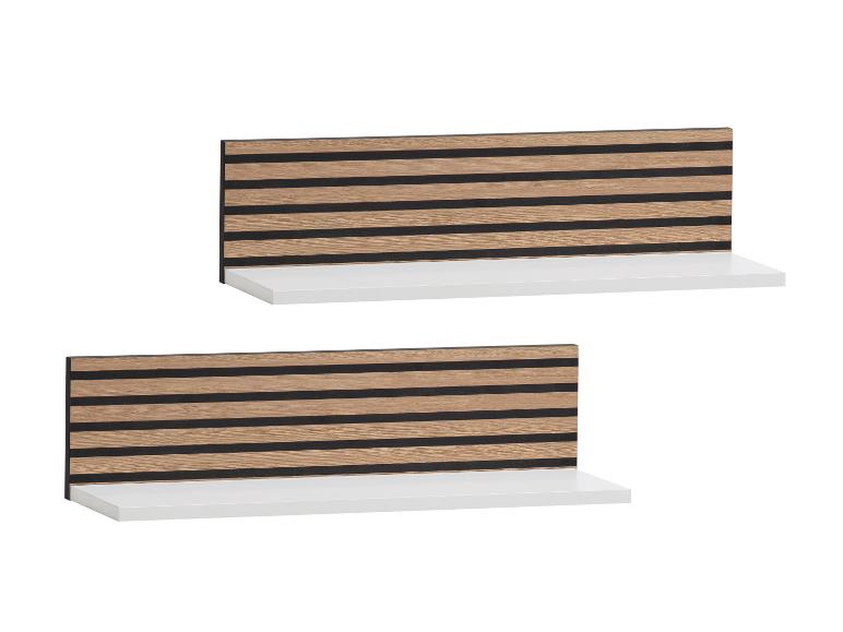 Twee witte planken met een houten en zwart lattenpaneel.