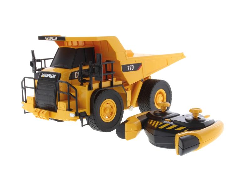 Gele Caterpillar 770 dumptruck en afstandsbediening.