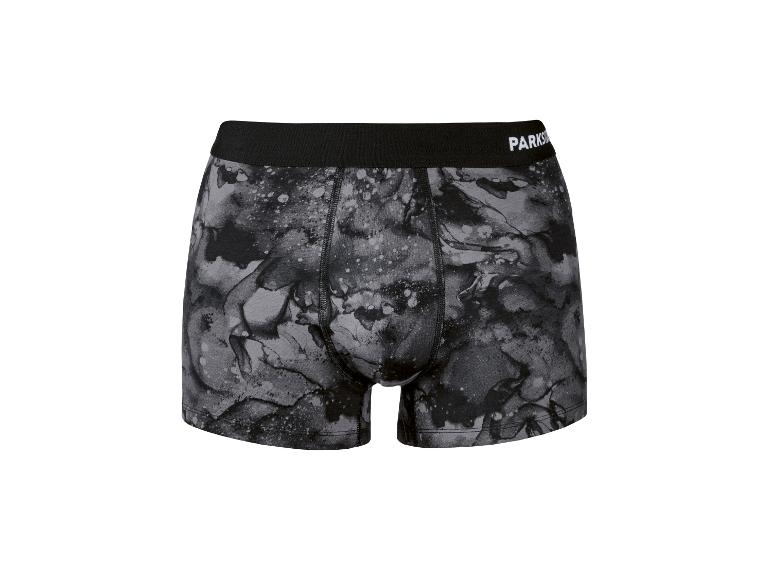 Herenboxershorts met grijs en zwart marmerprint, met zwarte elastische tailleband.