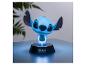 Lichtgevend Disney Stitch-figuur op een zwarte basis.