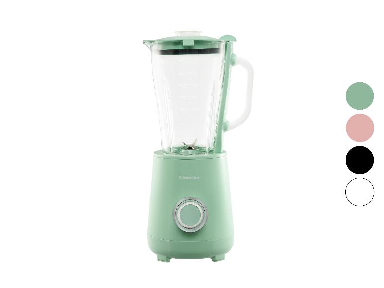 Mintgroene blender met glazen kan en ronde bedieningsknop.