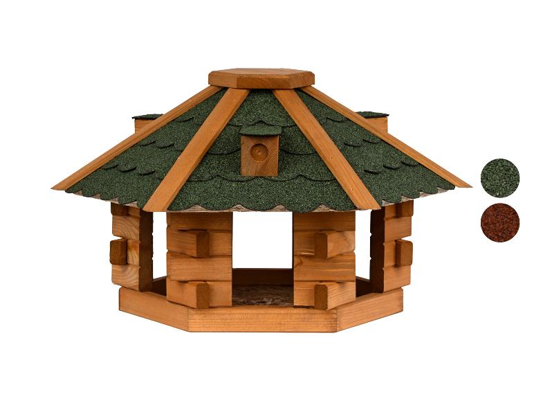 Houten vogelvoederhuisje met groen dak en dak kleurmonsters.