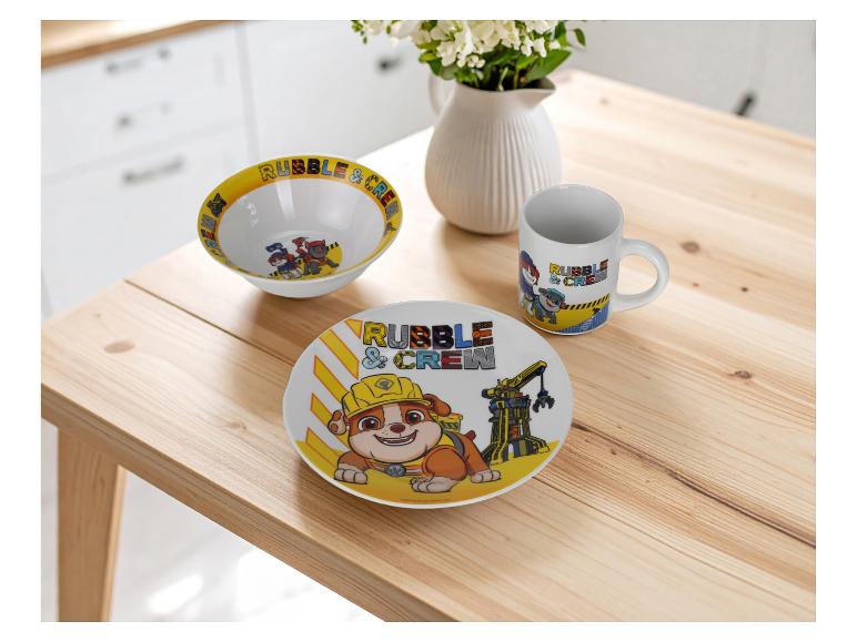 Paw Patrol Rubble & Crew servies op een houten tafel.