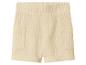 Beige mousseline short met elastische taille en zakken.