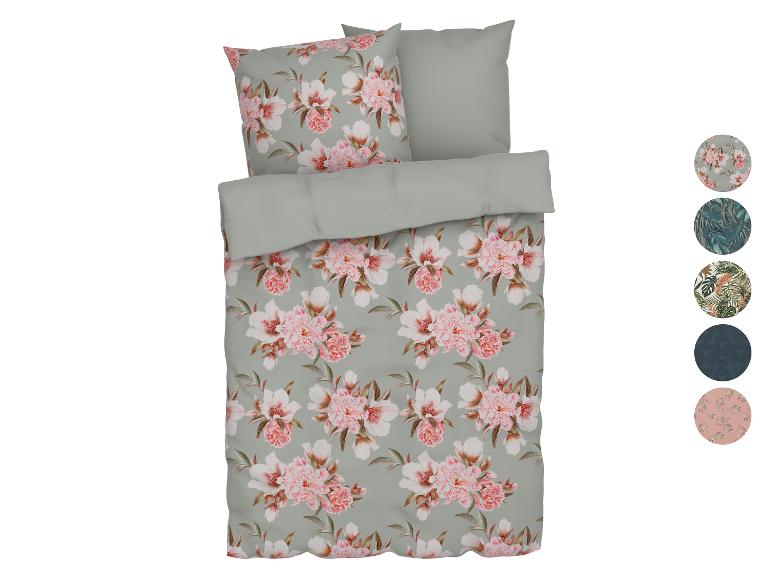 Bloemen beddengoed in zachte kleuren.