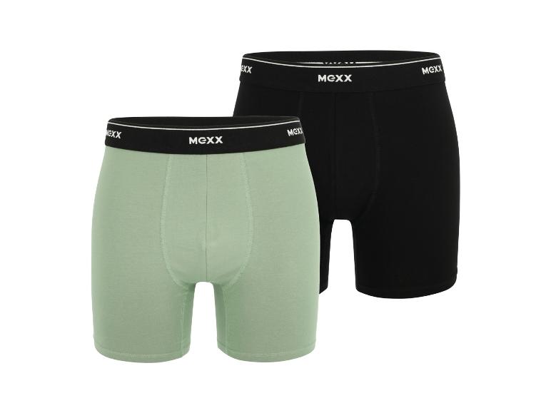 Twee herenboxershorts, één lichtgroen en één zwart, met een zichtbaar logo op de tailleband.