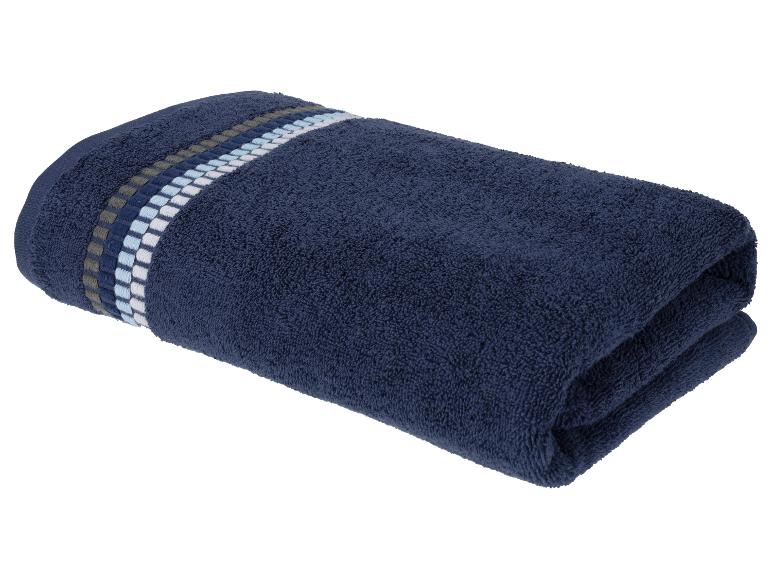 Donkerblauwe handdoek met decoratieve grijze, lichtblauwe en witte strepen