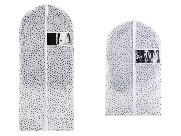 Twee kledingzakken met rits, met witte stippen op een grijze achtergrond.