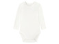 Witte baby romper met lange mouwen.