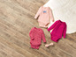Babykleding met lange mouwen, waaronder een roze 'Lovely Day' romper.