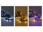 Witte, warmwitte en veelkleurige LED-kerstverlichting op dennentakken.