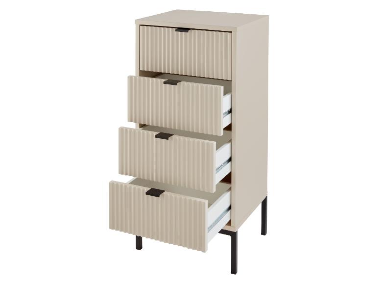 Een beige ladekast met vier laden.