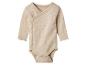 Beige babyromper met lange mouwen en zijsluiting met drukknopen