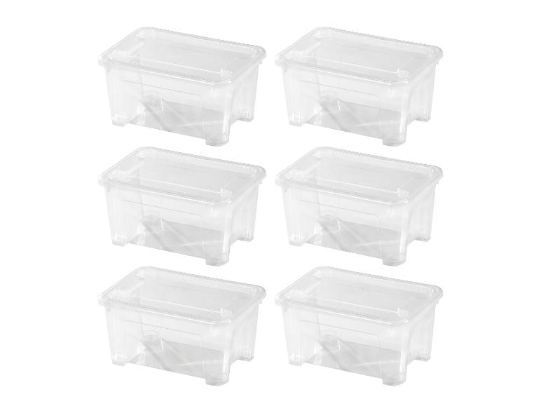 Zes transparante plastic opbergdozen met deksels, gerangschikt in twee kolommen op een witte achtergrond.