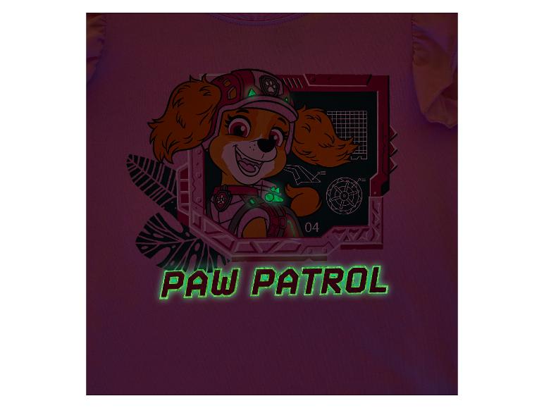 Roze T-shirt met een glimlachend puppy-motief en lichtgevende tekst 'PAW PATROL'.
