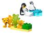 LEGO DUPLO set met pinguïn- en leeuwenwelpfiguren en bouwstenen.