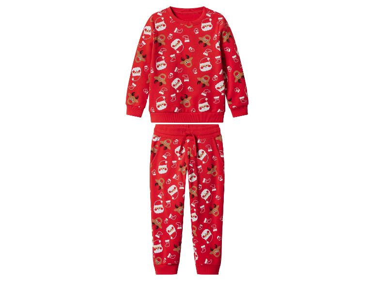 Rode kerstpyjama voor kinderen met kerstman- en rendierprint