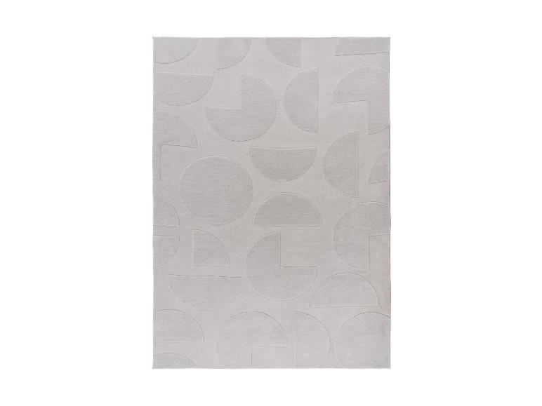 Lichtgrijs vloerkleed met een geometrisch patroon van cirkels en halve cirkels.