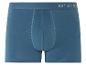Een paar blauwe boxershorts met een wit logo.