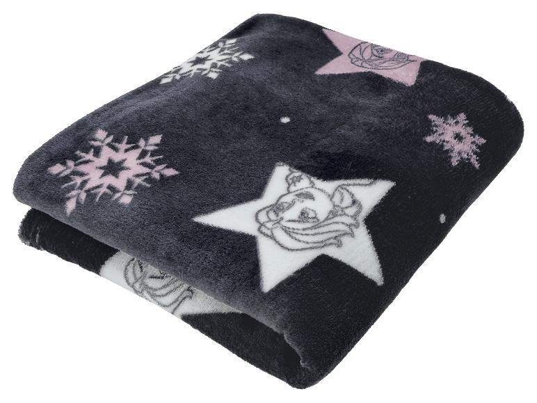 Zwarte deken met roze sneeuwvlokken en sterren met stripfiguren.