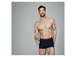 Man draagt donkerblauwe boxershorts met ankerprint.