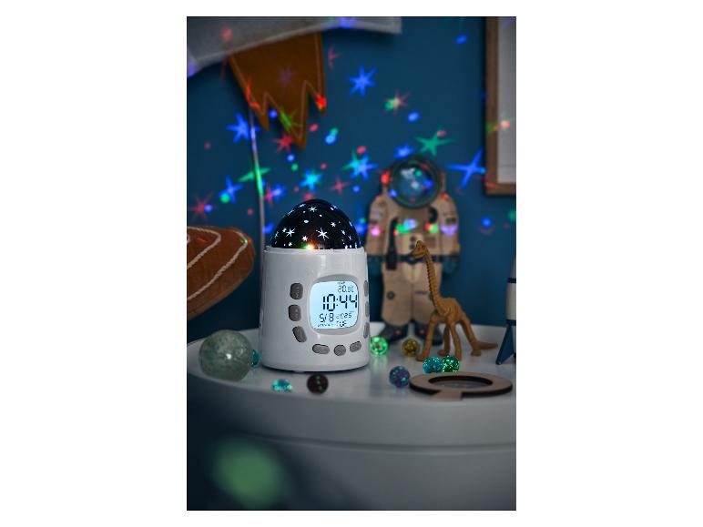 Een Gro Company wekker met sterrenprojector in een kinderkamer.