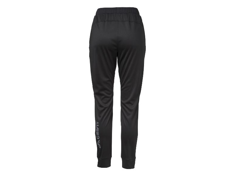 Zwarte dames sportbroek met elastische tailleband en logo op de pijp.