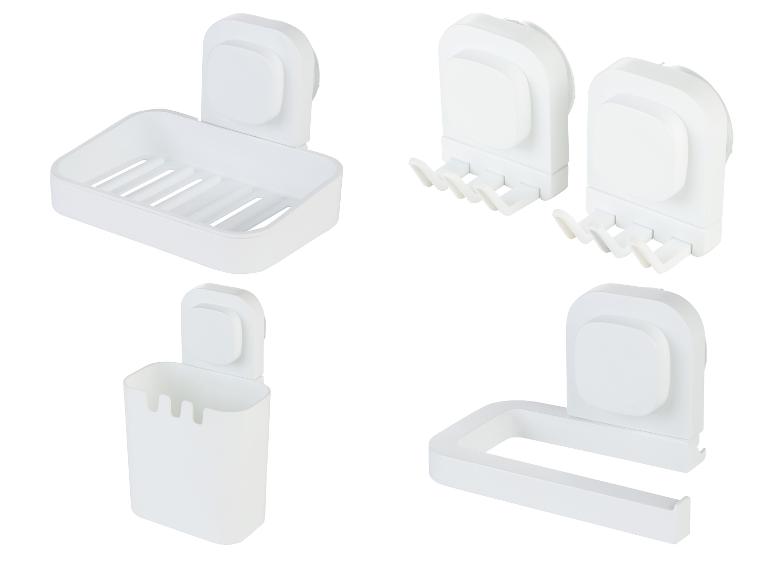 Witte badkameraccessoireset met zeepbakje, tandenborstelhouder en haken.