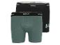 Twee boxershorts van Mexx, een groene en een zwarte.