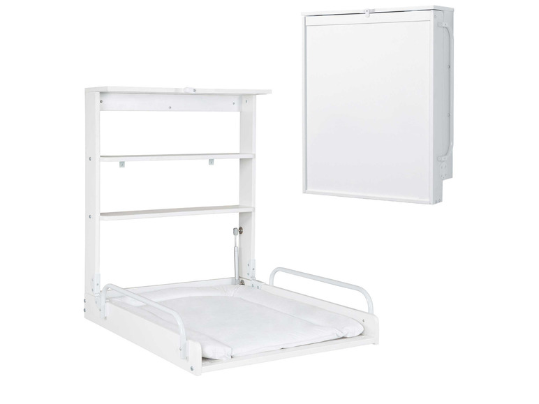 Een wit verschoningstafel met opbergvakken en een extra kastje.