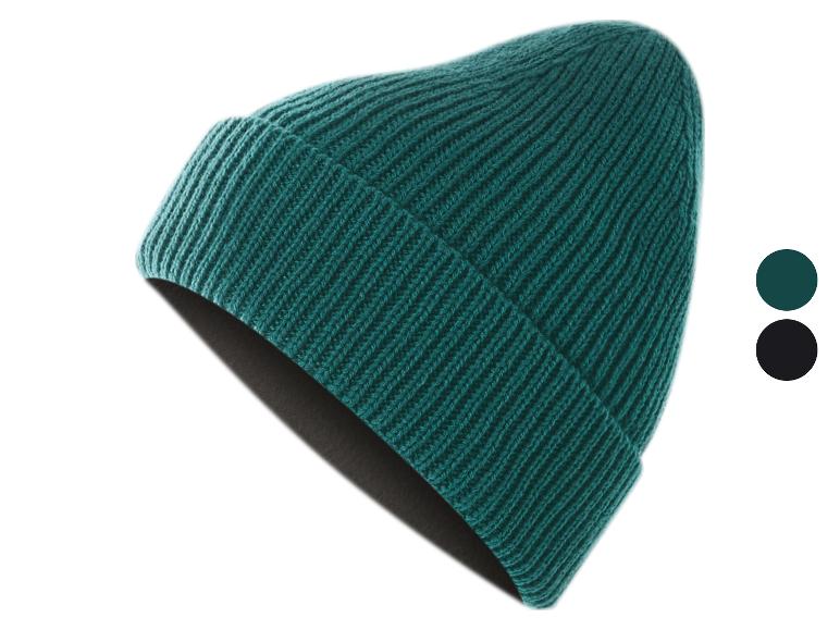 Teal gebreide muts met omgeslagen rand, met kleurstalen voor teal en zwart.