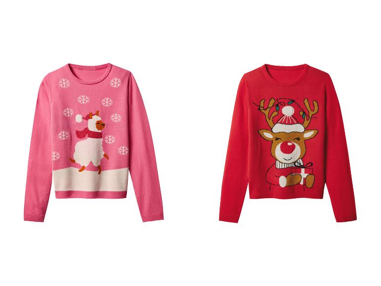 Twee kersttruien: een roze met een lama en sneeuwvlokken, en een rode met een rendier.