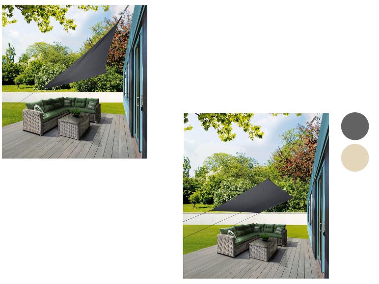 Driehoekige schaduwdoek en rotan tuinmeubels.