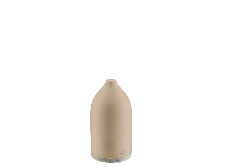 Beige keramische aromadiffuser met bedieningsknoppen aan de onderkant.