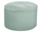 Een ronde, lichtgroene poef met een witte rand.