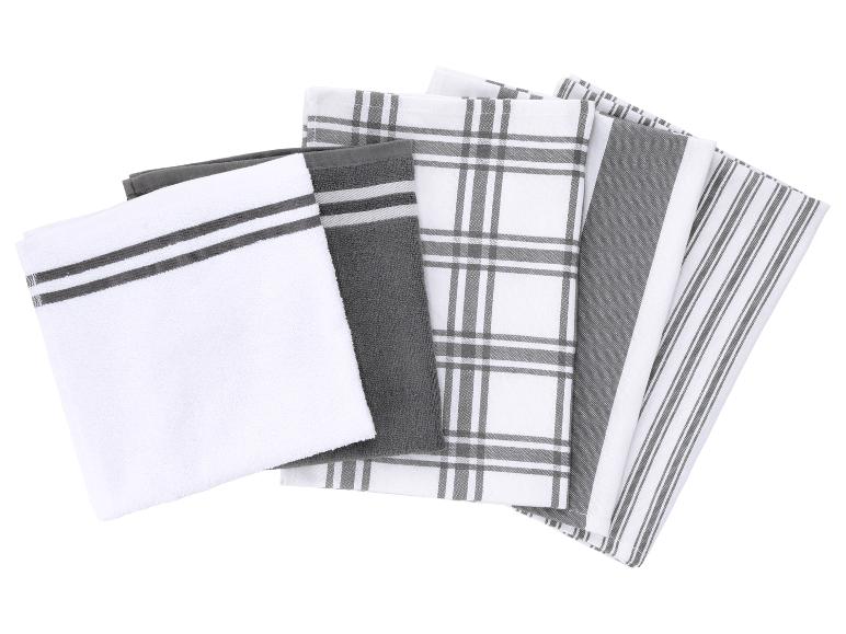 Een set grijze en witte keukendoeken met strepen en ruitpatronen.