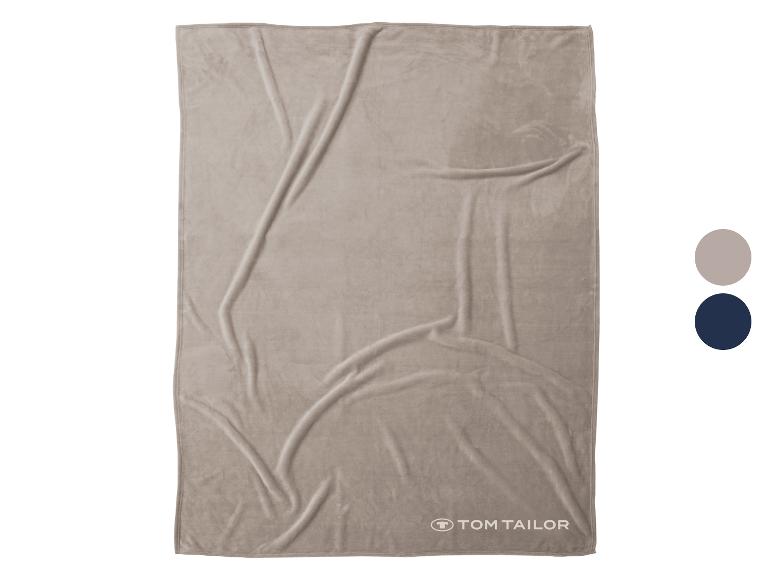 Beige fleece deken met logo rechtsonder en twee kleurstalen
