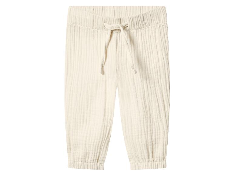 Crèmekleurige mousseline broek met trekkoord in de taille