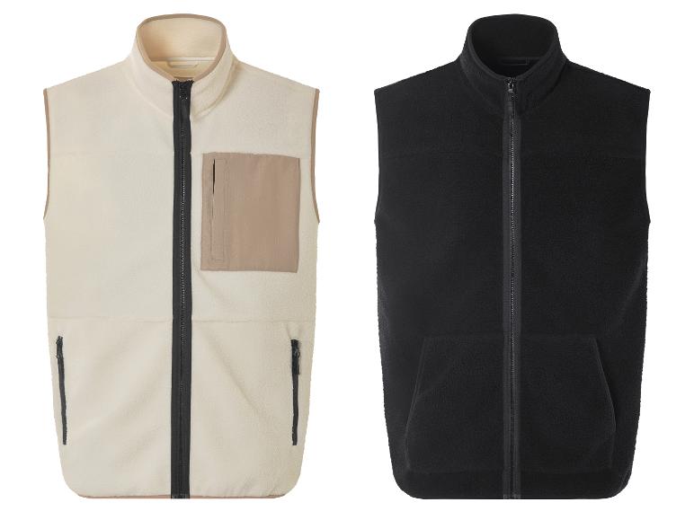 Twee fleece vesten met rits, een crèmekleurig en een zwart.