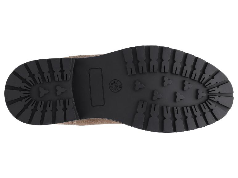 Zool van een bruine laars met profielpatroon