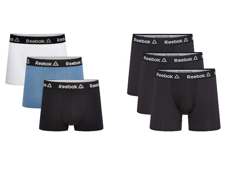 Zes Reebok boxershorts voor heren in wit, blauw en zwart.