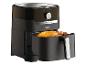 Zwarte Tefal Easy Fry & Grill airfryer met hele kip en kippenpoten