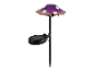 Een op zonne-energie werkende paddenstoelvormige tuinlamp.