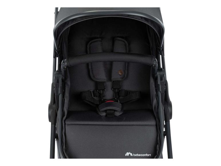 Zwarte kinderwagen met veiligheidsharnas en beugel
