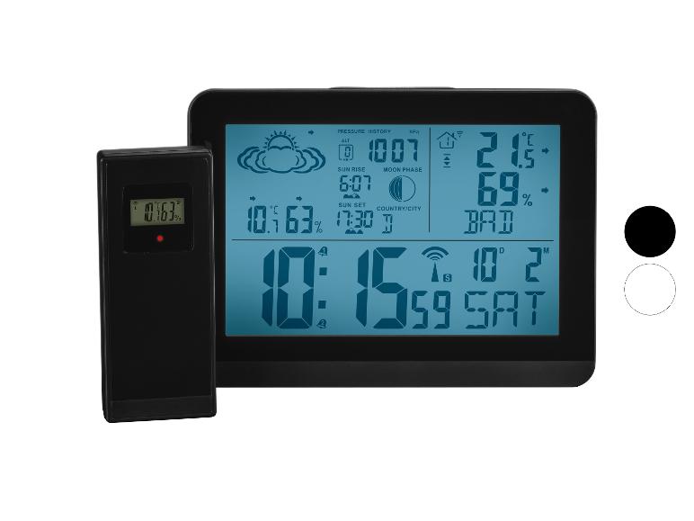 Digitaal weerstation met draadloze sensor, toont tijd, datum, temperatuur en luchtvochtigheid.