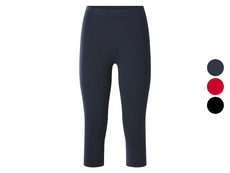 Donkerblauwe 3/4 legging met drie kleurpunten: donkerblauw, rood en zwart.