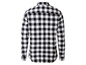 Een zwart-wit geruit overhemd met lange mouwen.