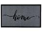 Grijze deurmat met zwarte rand en het woord 'home' in sierlijk schrift.